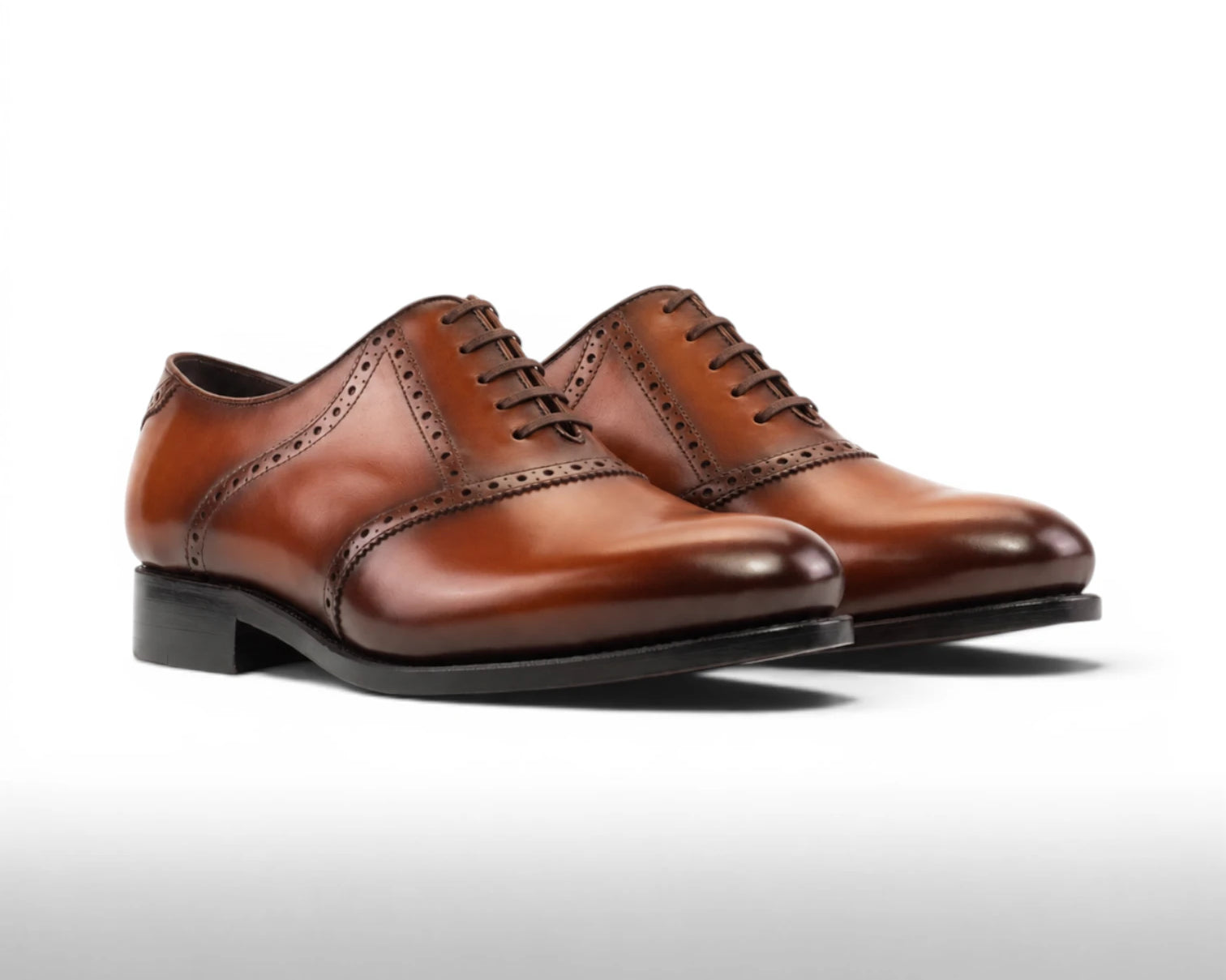 Saddle_Medium_brown_cognac_1_dc79db35-d17b-40c5-90fa-183da05c26b5.webp