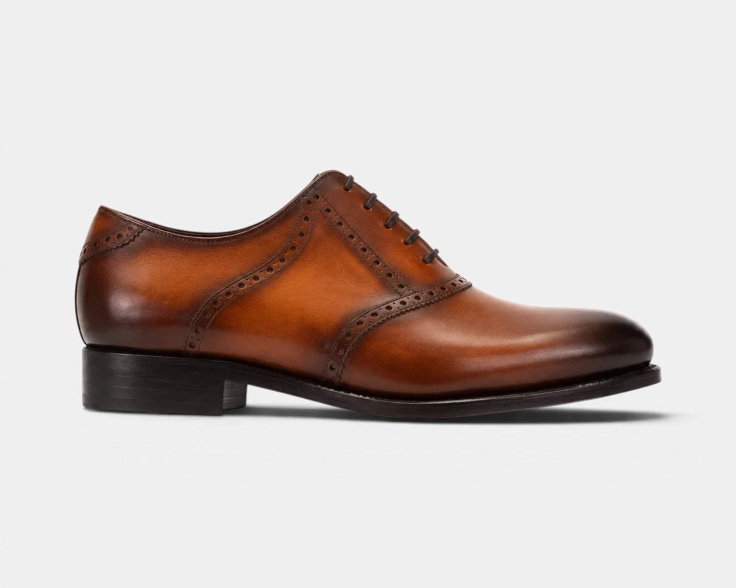 Saddle_Medium_brown_cognac_2_bf36e162-615f-4bf4-9b8c-59d9ff8b4c2d.webp