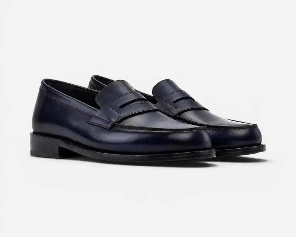 Seamless-Toe_Navy_Penny_Loafers.webp