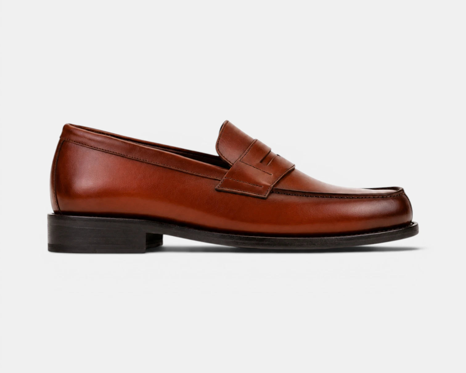 pennyloafer-cognac.webp